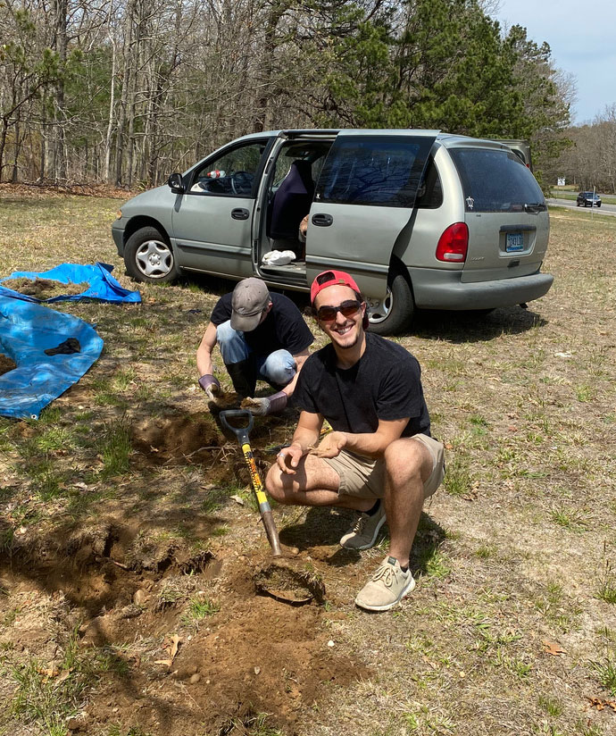Spencer Bennett helping to dig cicada nymphs on Long Island